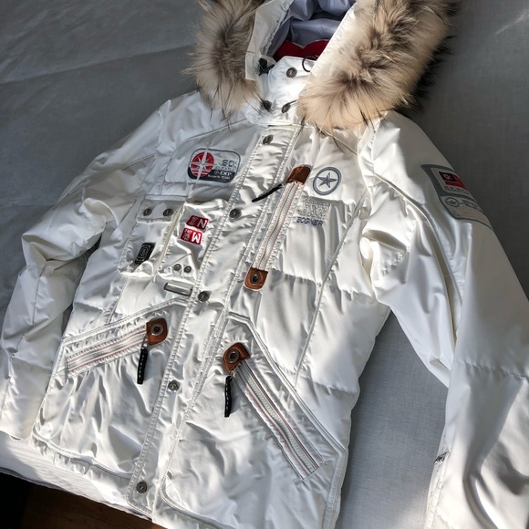 white ski jacket with fur hood